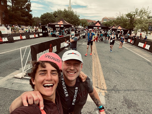 New Jersey holistic therapist David White smiles with his son as they complete a race