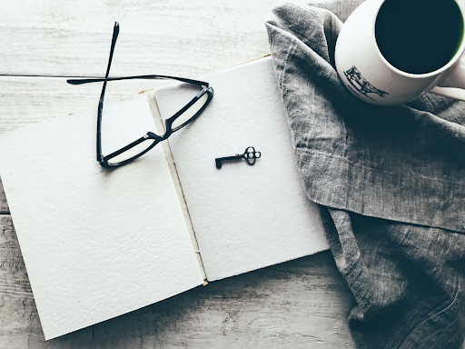 reading-glasses-laying-on-top-notebook