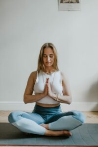 Woman Doing Yoga in A Room