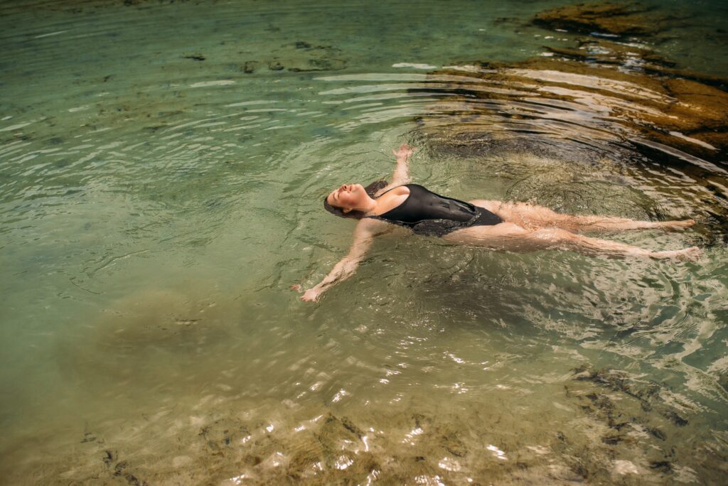 woman at a New Jersey beach thinking about self-acceptance and healing from trauma