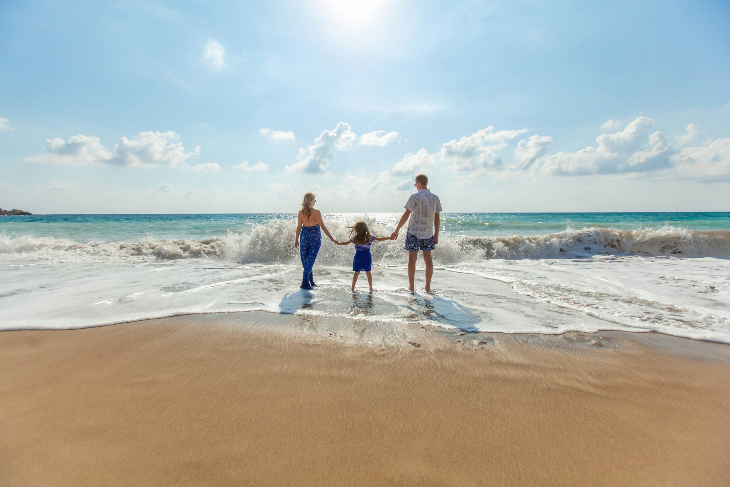 family on the beach representing the healing that comes from therapy at awakened path in new jersey