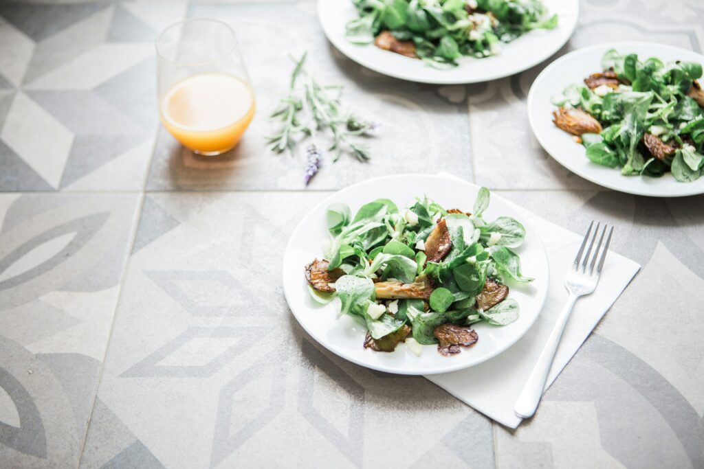 a plate with salad on it representing a healing eating disorder through therapy